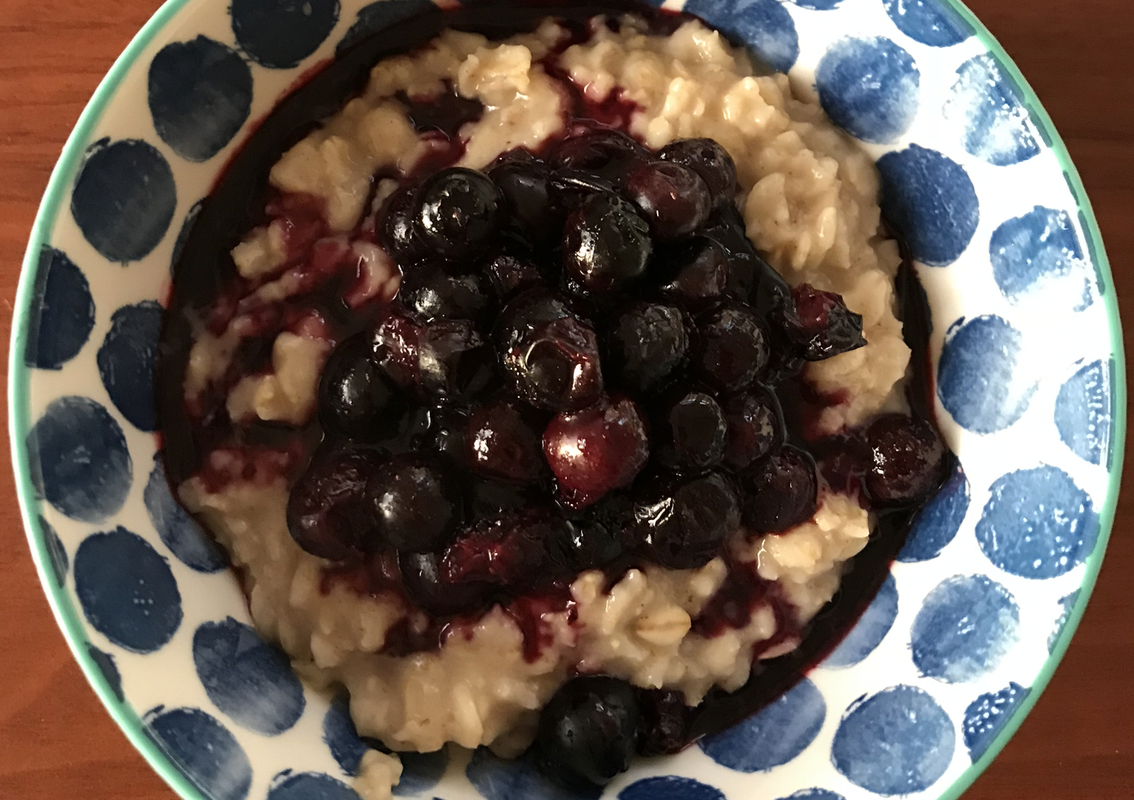 Hot oatmeal breakfast with blueberries